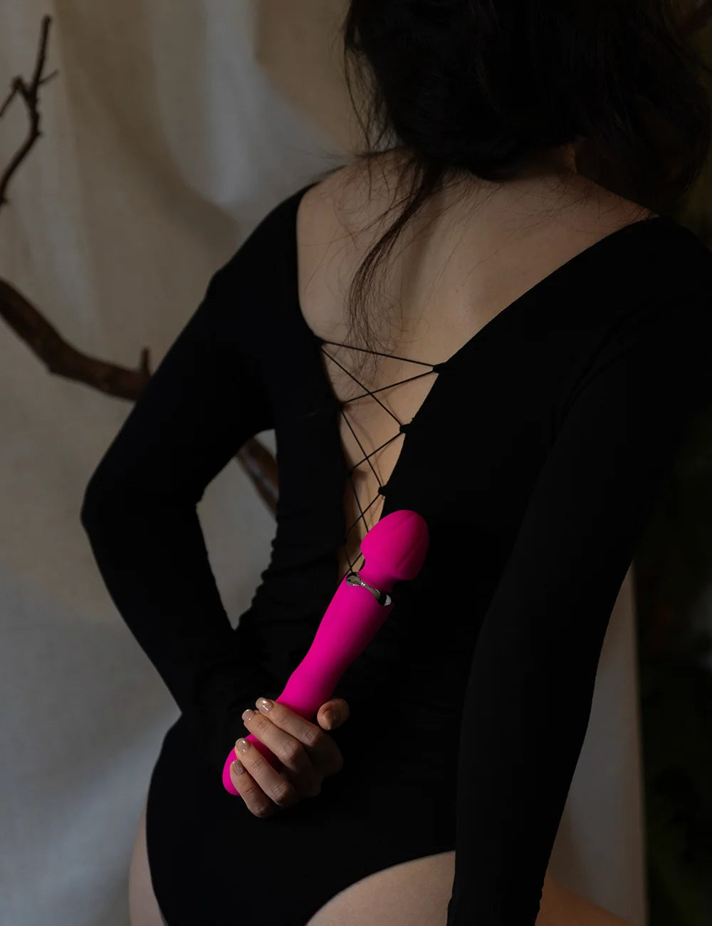 SHEVEREIGN Mighty Touch Wand Vibrator header dropdown image showcasing its bold magenta wand silhouette against black attire, symbolising power and sensual rhythm