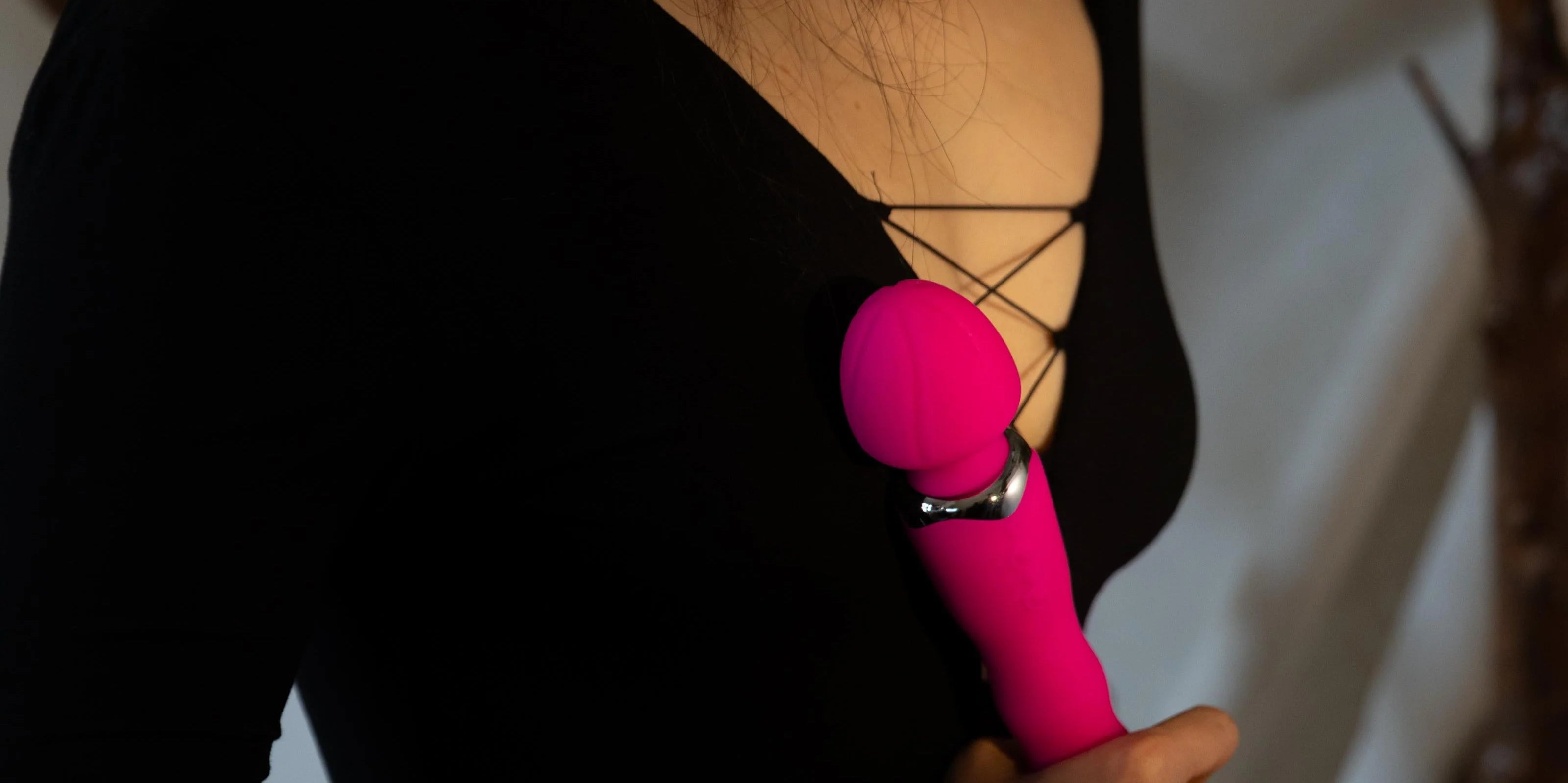 SHEVEREIGN Mighty Touch Wand Vibrator video cover image featuring its fuchsia pink wand design, representing strength, rhythm, and the art of feminine power through touch and motion