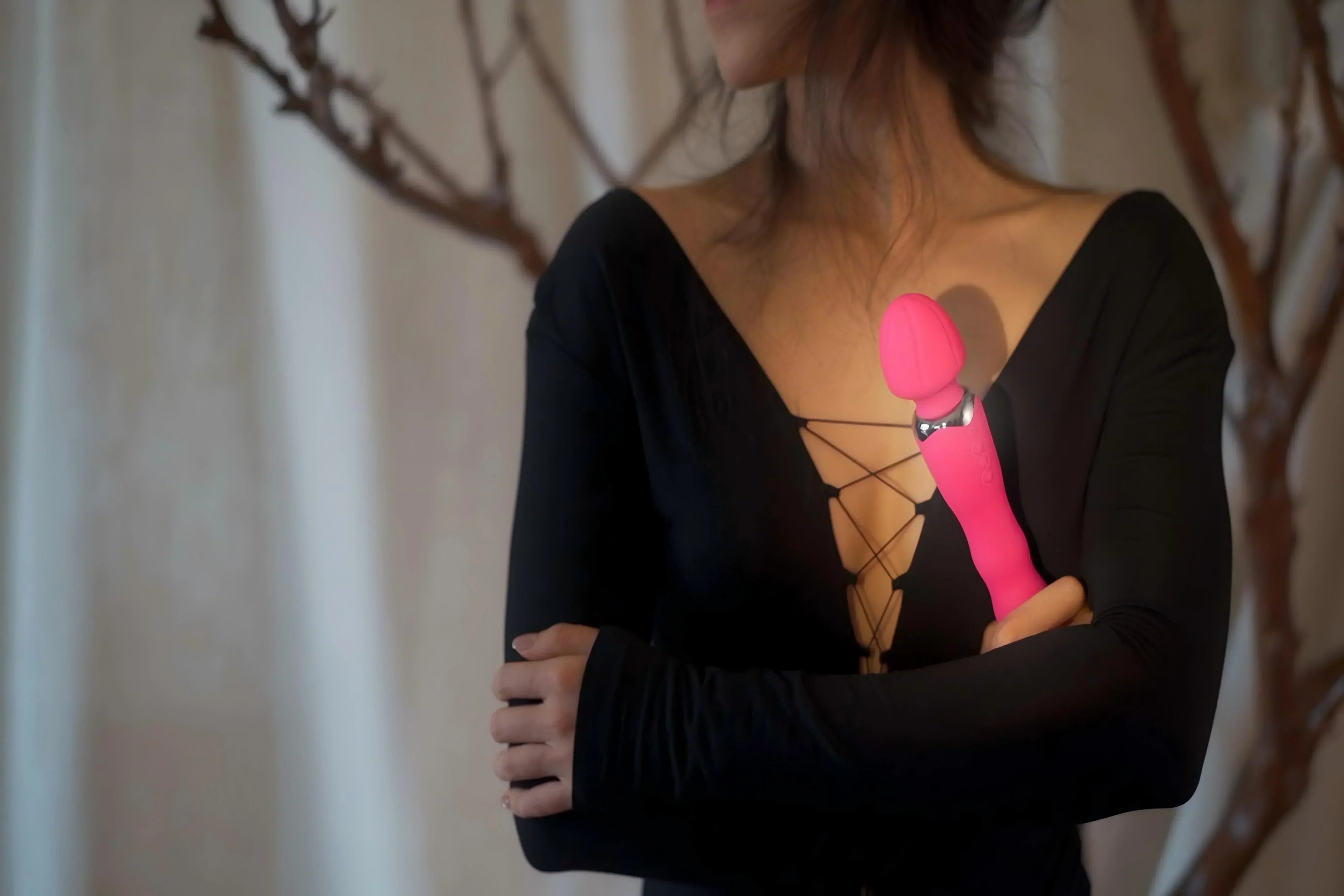 SHEVEREIGN woman holding a wand vibrator, main visual for an article about eight myths about vibrators